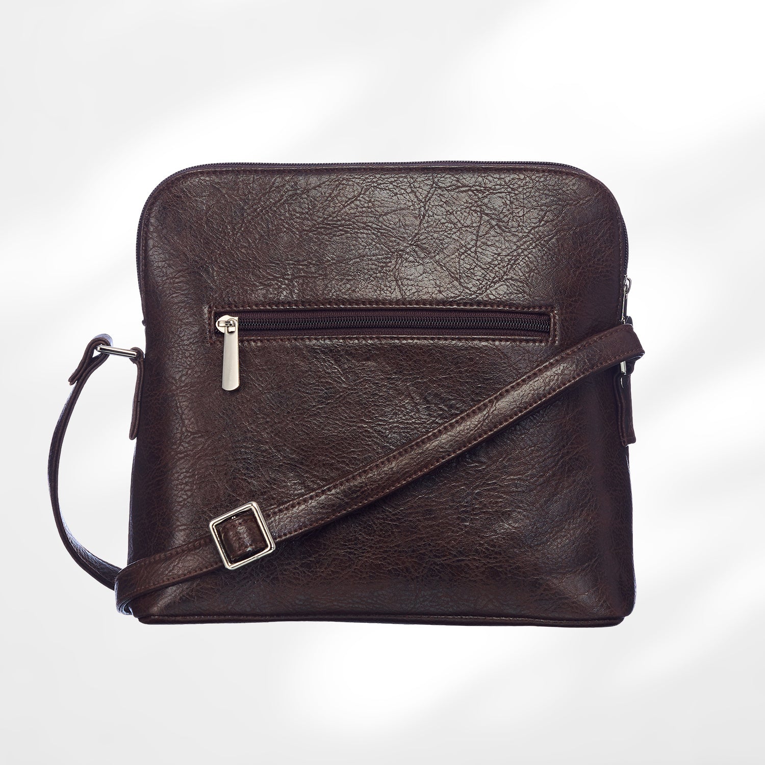 Brown leather crossbody bag with a silver buckle on a white background